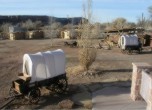 Bluff Fort -- Bluff Fort wagons, cabin replicas in the distance. Lamont Crabtree Photo 